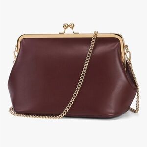 Kisslock buttery soft wine colored Leather like Handbag